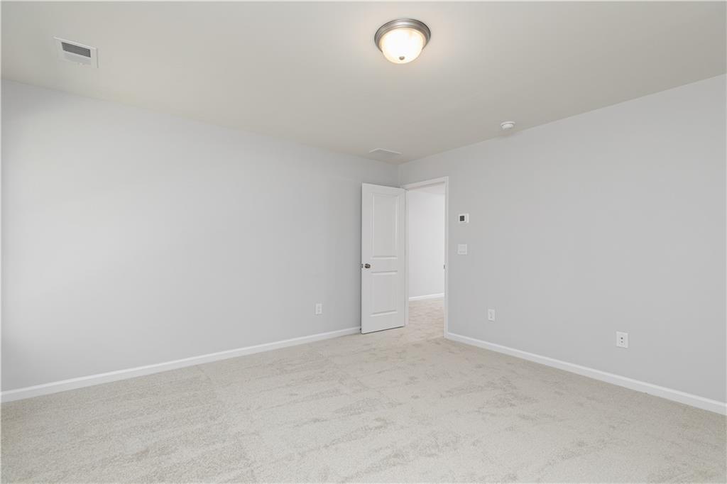326 Cavalier Lane Acworth, GA 30102 - Photo 25 of 64 an empty room with an entryway