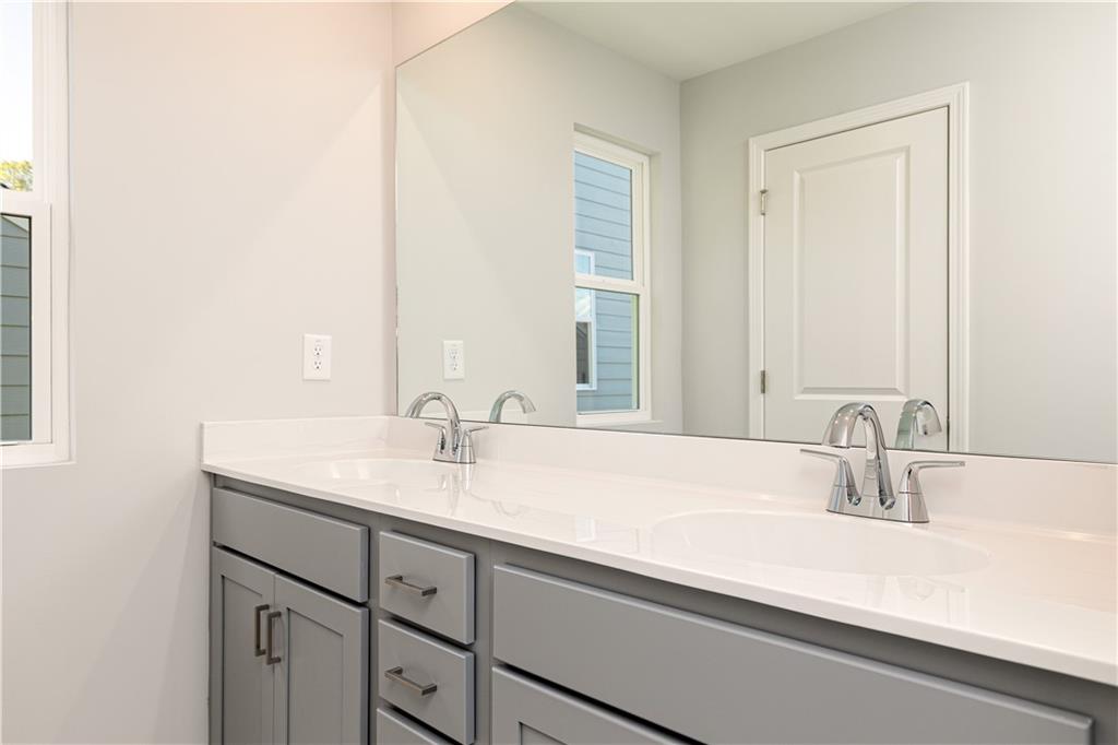 326 Cavalier Lane Acworth, GA 30102 - Photo 27 of 64 a bathroom with a sink and a mirror