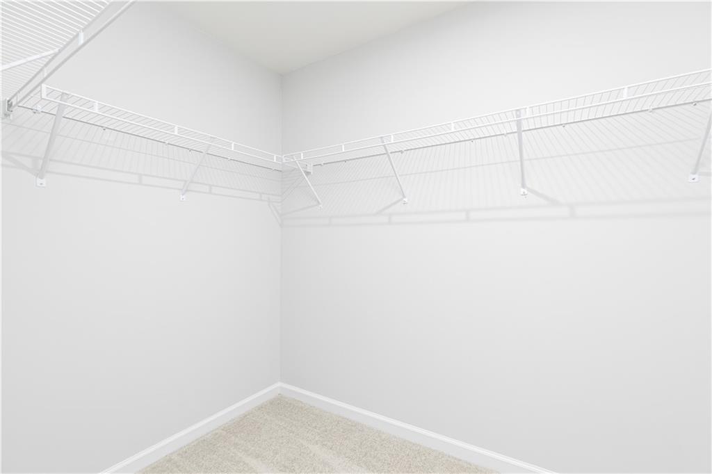 326 Cavalier Lane Acworth, GA 30102 - Photo 28 of 64 a view of a small space with racks on the wall