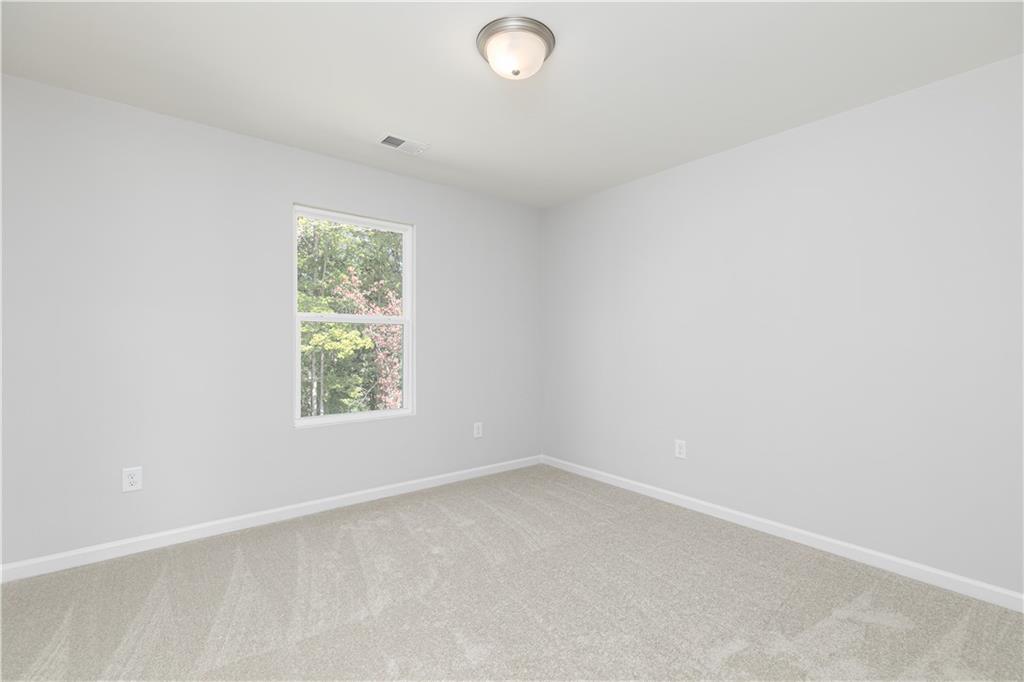 326 Cavalier Lane Acworth, GA 30102 - Photo 29 of 64 an empty room with a window