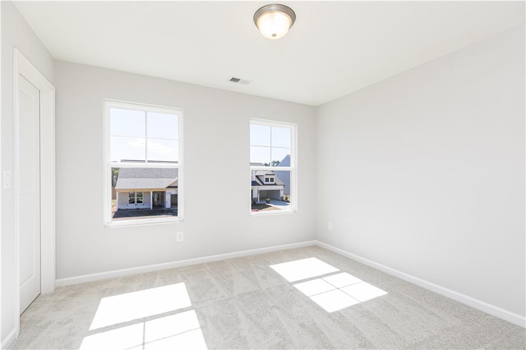 326 Cavalier Lane Acworth, GA 30102 - Photo 31 of 64 an empty room with windows