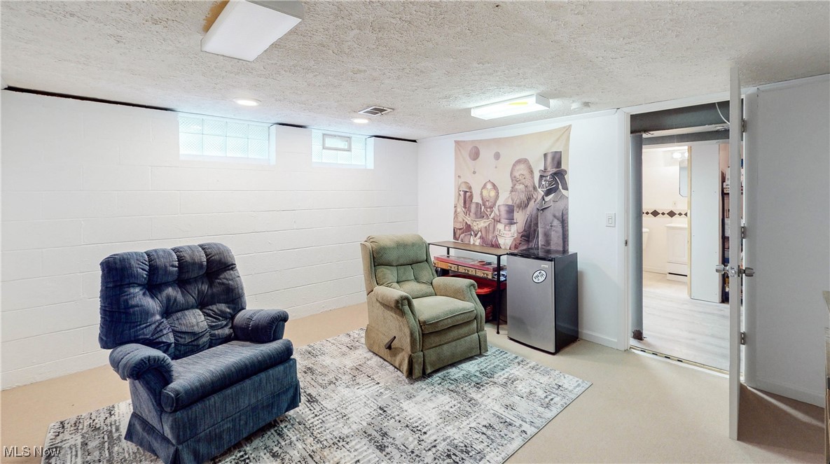 35600 Bainbridge Road Solon, OH 44139 - Photo 12 of 18 basement area with newer carpeting and full bathroom