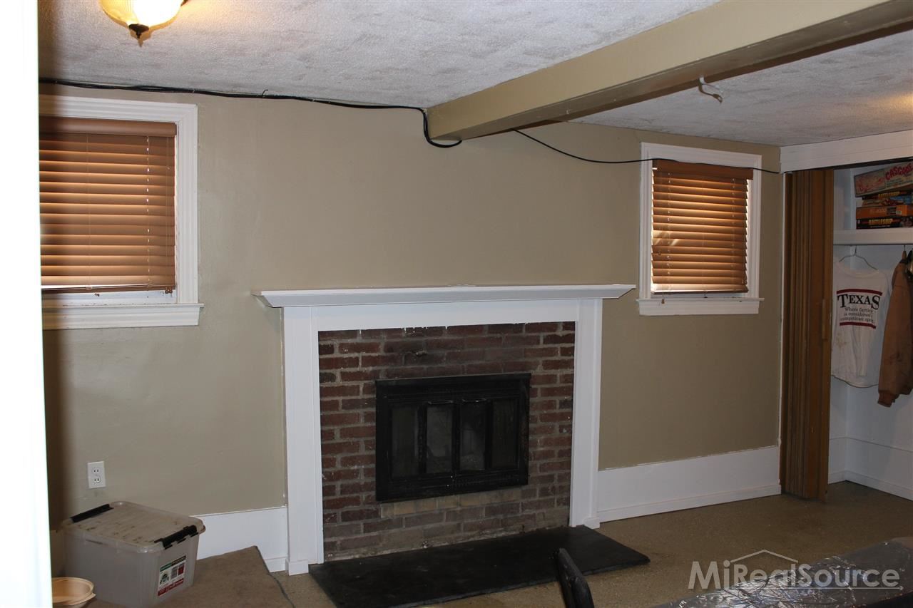 2936 Harvey Street Rochester, MI 48309 - Photo 19 of 29 The finiished basement has a family room, great for kids or family get togethers. Complete with daylight windows, this is a wonderful space!
