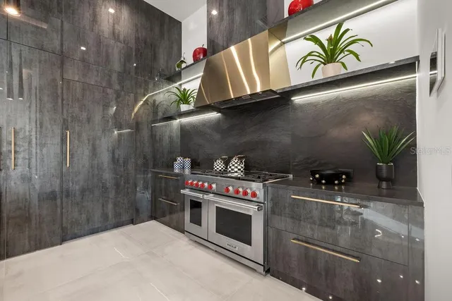 a kitchen with a refrigerator and countertop