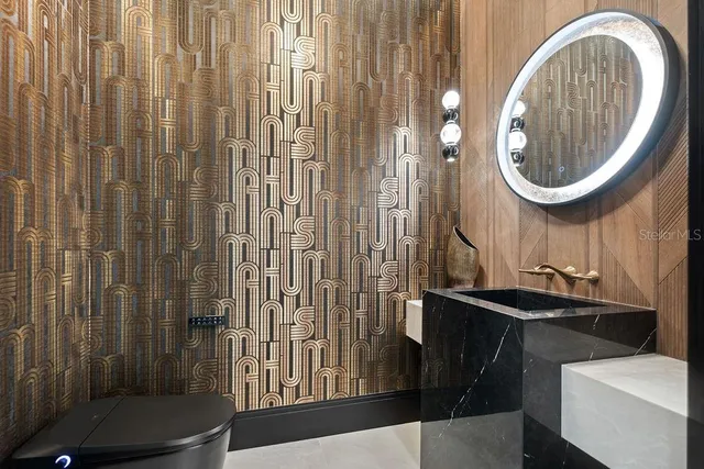 a bedroom with a bed and dresser