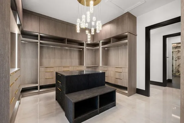 a view of a yard with swimming pool and green space