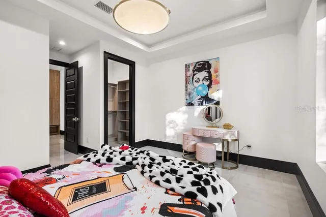a bathroom with a shower and a bath tub