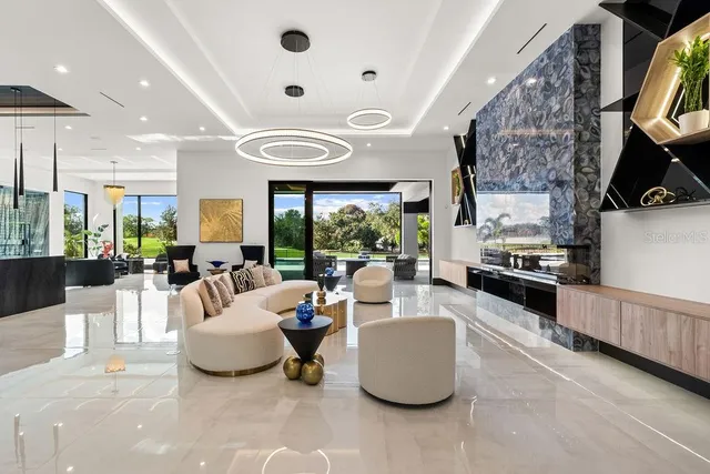 a kitchen with a stove and a potted plant