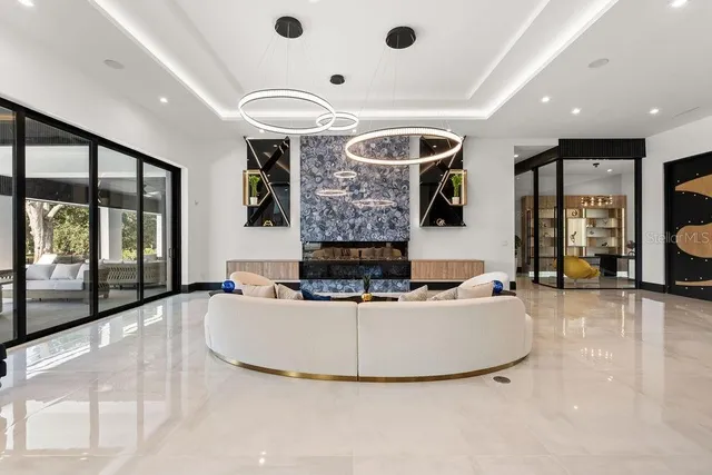 a kitchen with stainless steel appliances granite countertop a stove and a microwave