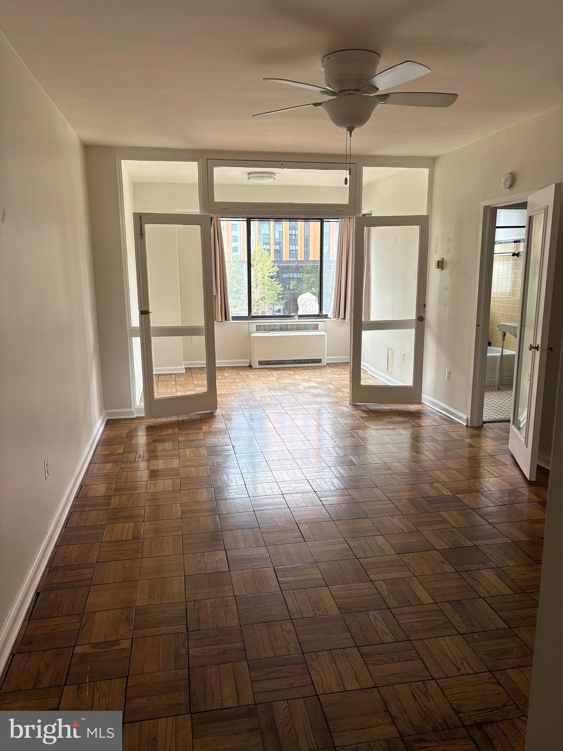 1 Scott Circle Northwest, Unit 203 Washington, DC 20036 - Photo 4 of 17 a view of an empty room and window