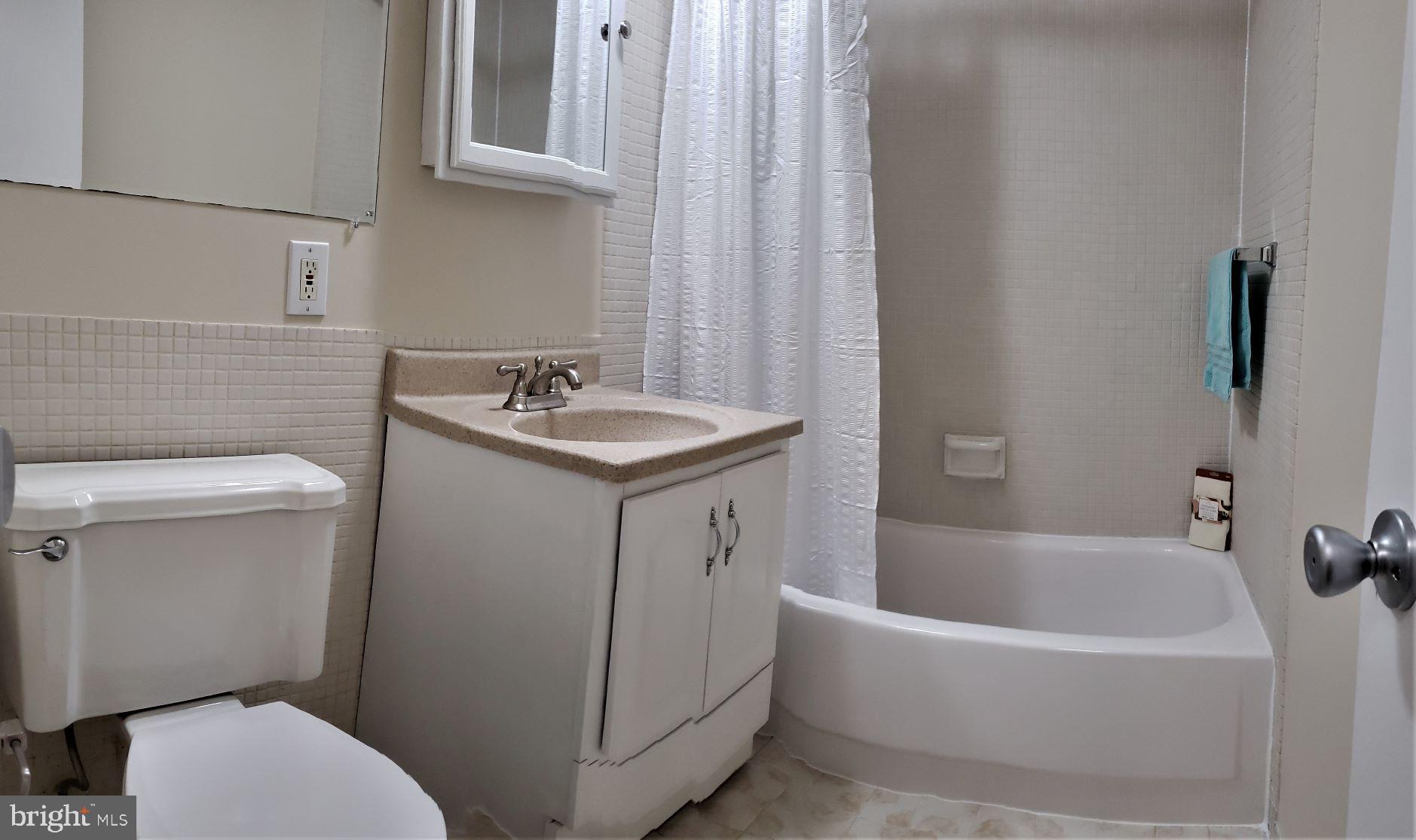 1250 4th Street Southwest, Unit W813 Washington, DC 20024 - Photo 10 of 26 a bathroom with a sink and toilet