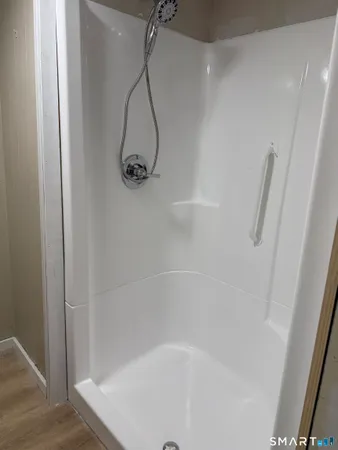 a close view of a bathtub in bathroom