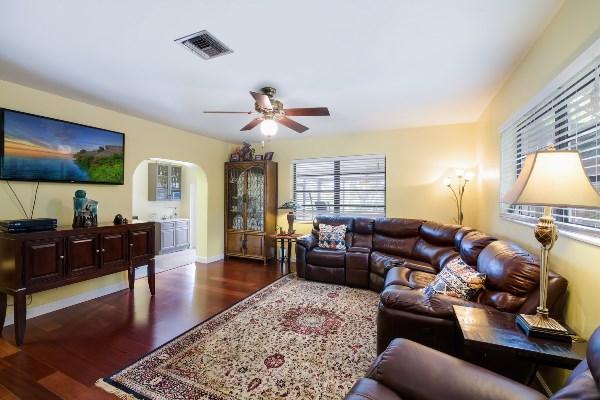 201 Oregon Lane Boca Raton, FL 33487 - Photo 12 of 31 a living room with furniture and a flat screen tv