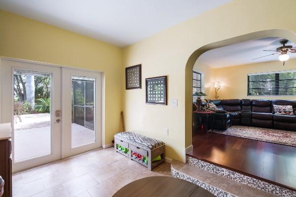 201 Oregon Lane Boca Raton, FL 33487 - Photo 13 of 31 a living room with furniture and a large window