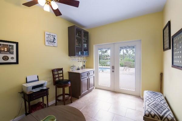 201 Oregon Lane Boca Raton, FL 33487 - Photo 14 of 31 a bedroom with a bed and a desk