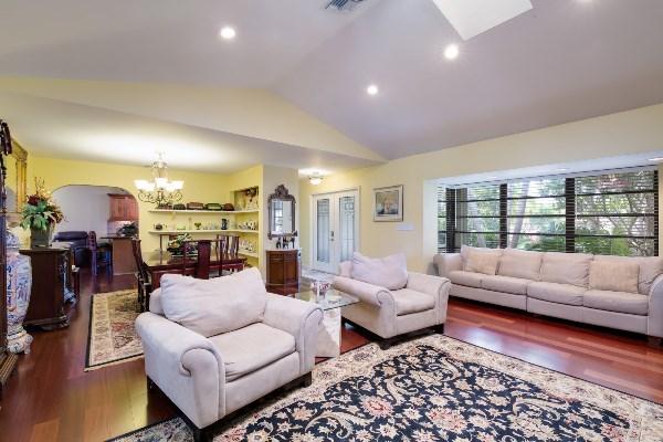 201 Oregon Lane Boca Raton, FL 33487 - Photo 15 of 31 a living room with furniture and a large window