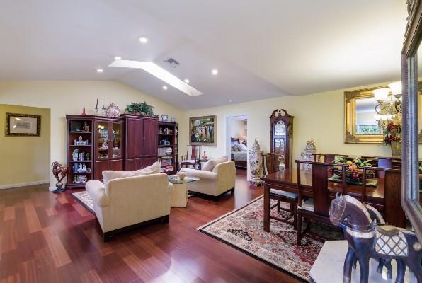 201 Oregon Lane Boca Raton, FL 33487 - Photo 19 of 31 a living room with furniture and wooden floor