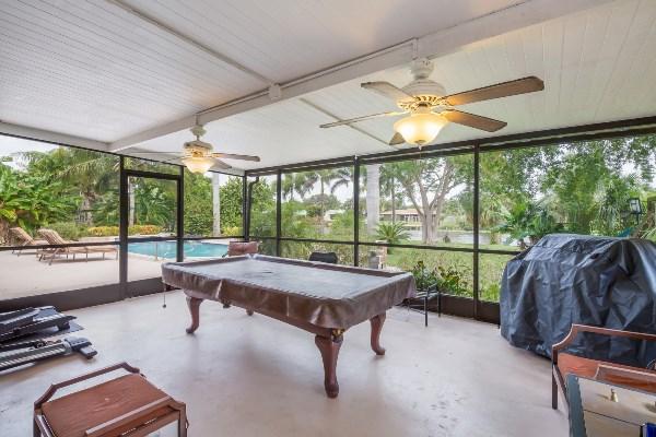 201 Oregon Lane Boca Raton, FL 33487 - Photo 25 of 31 a room with pool table and windows