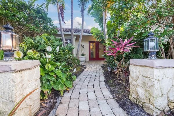 201 Oregon Lane Boca Raton, FL 33487 - Photo 4 of 31 a view of a house with a yard