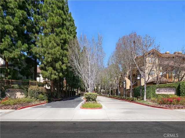 a view of a street with houses