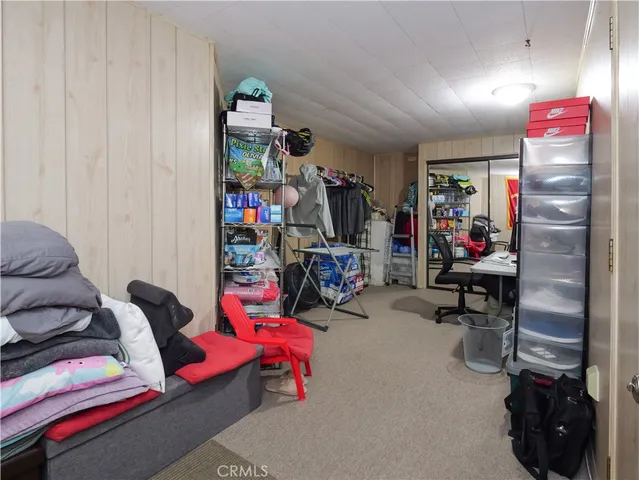 a view of a workspace with furniture