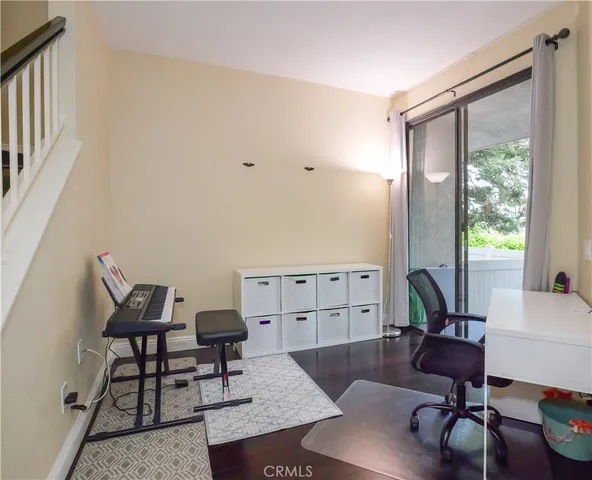 a kitchen with stainless steel appliances granite countertop a stove microwave and sink