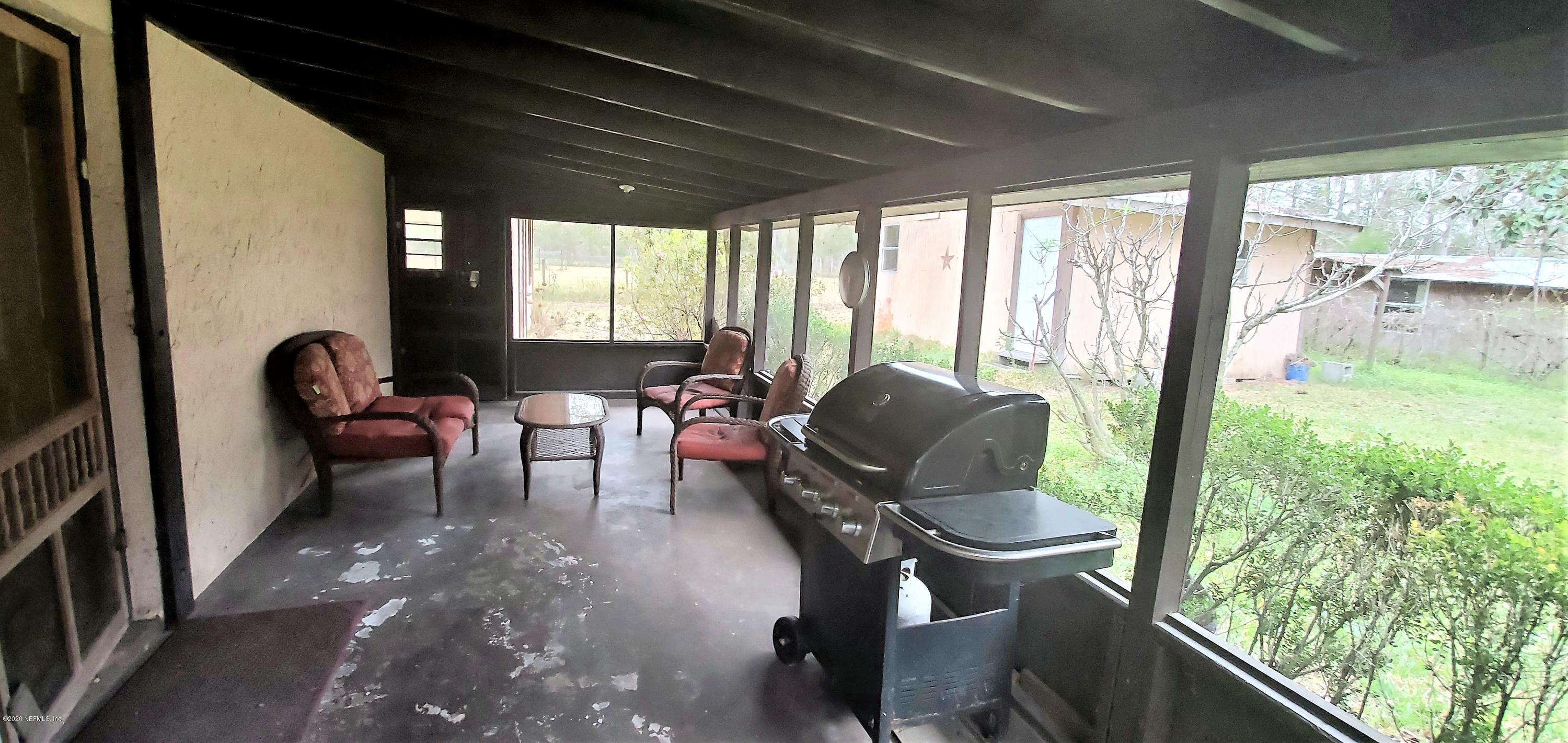 5220 Yellow Water Road Jacksonville, FL 32234 - Photo 16 of 17 back porch living