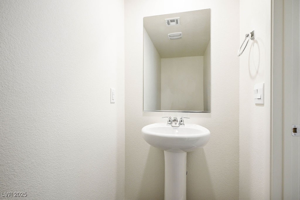 6184 Hibiscus Gdn Street North Las Vegas, NV 89081 - Photo 13 of 35 View of half bath