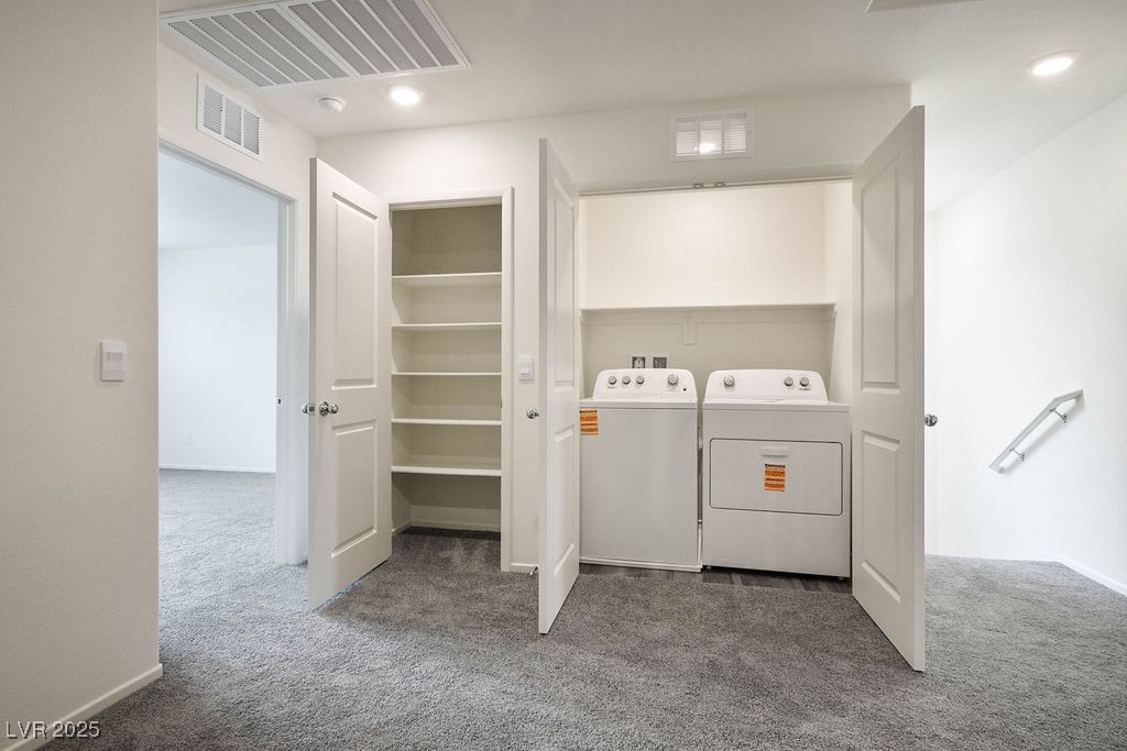 6184 Hibiscus Gdn Street North Las Vegas, NV 89081 - Photo 3 of 35 Laundry room featuring washing machine and dryer, carpet flooring, and recessed lighting