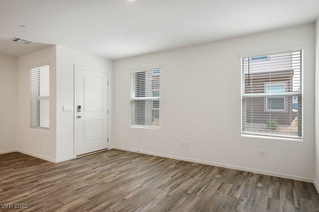 6184 Hibiscus Gdn Street North Las Vegas, NV 89081 - Photo 6 of 35 Entryway featuring wood finished floors and plenty of natural light