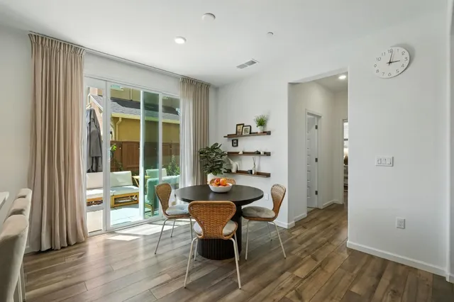 a work room with furniture and wooden floor