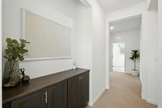 a view of entryway with wooden floor