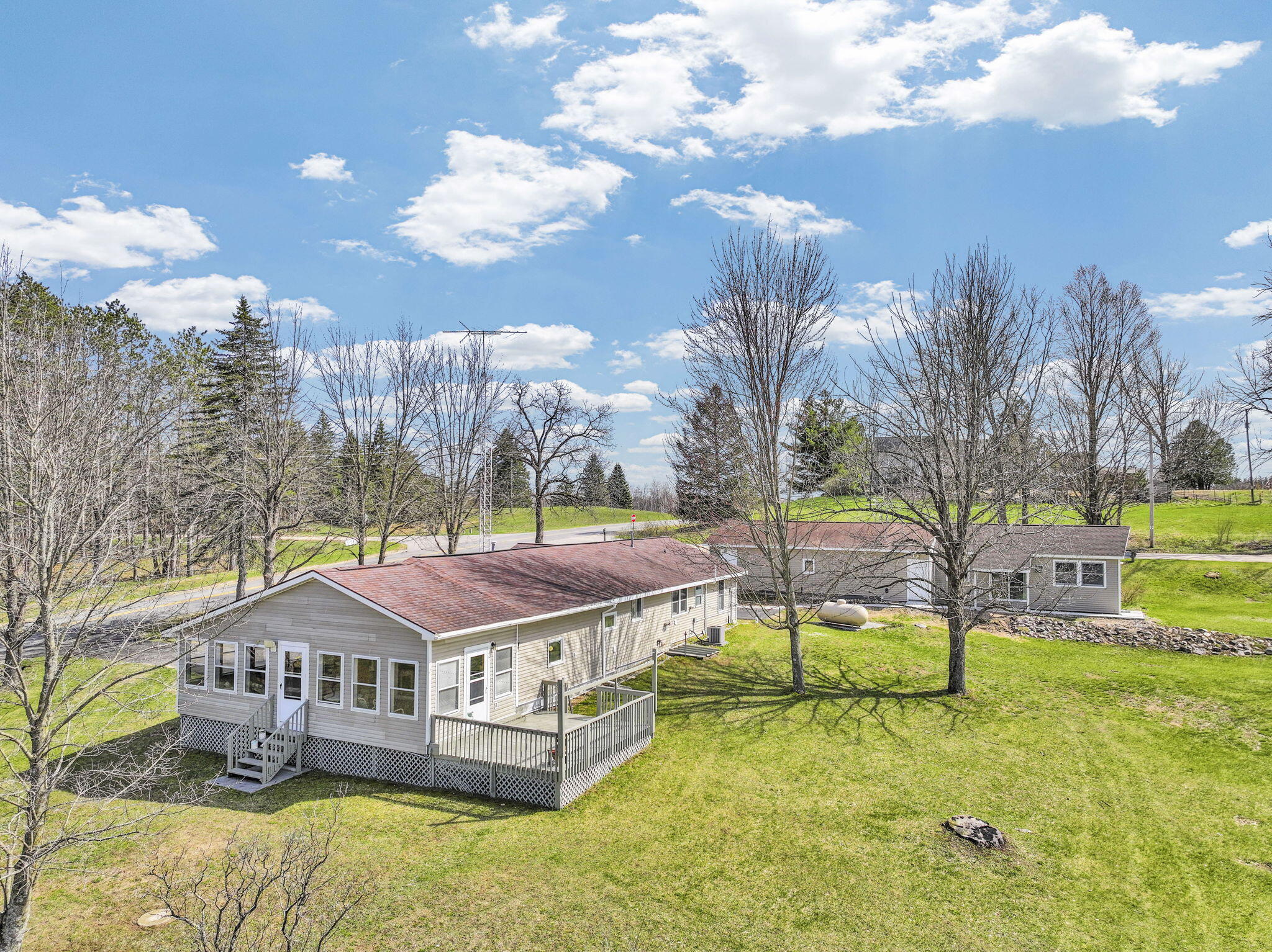 10976 East 3 Mile Road Luther, MI 49656 - Photo 2 of 39 DJI_20260420155208_0841_D