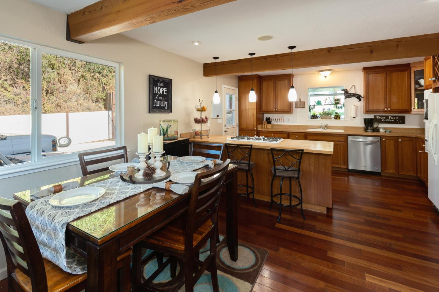 100 Smith Road Watsonville, CA 95076 - Photo 3 of 25 a view of a dining room with furniture window and wooden floor