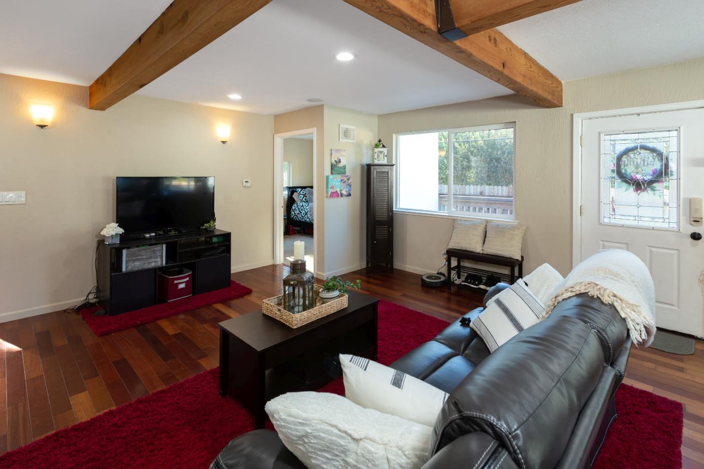 100 Smith Road Watsonville, CA 95076 - Photo 8 of 25 a living room with furniture and a flat screen tv