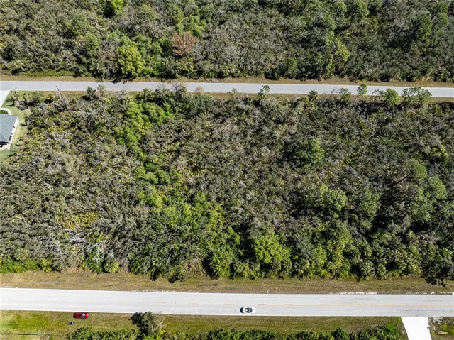 a view of swimming pool from a balcony