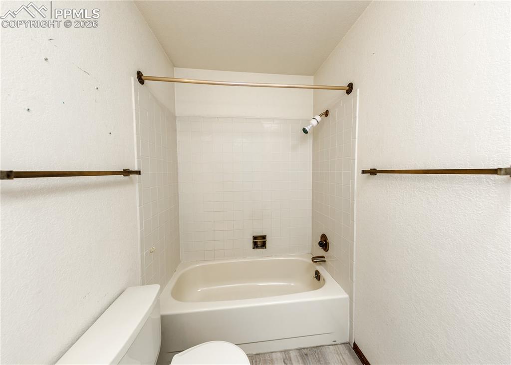 55 Bonnymede Road, Unit S Pueblo, CO 81001 - Photo 24 of 24 a bathroom with a bathtub and a shower