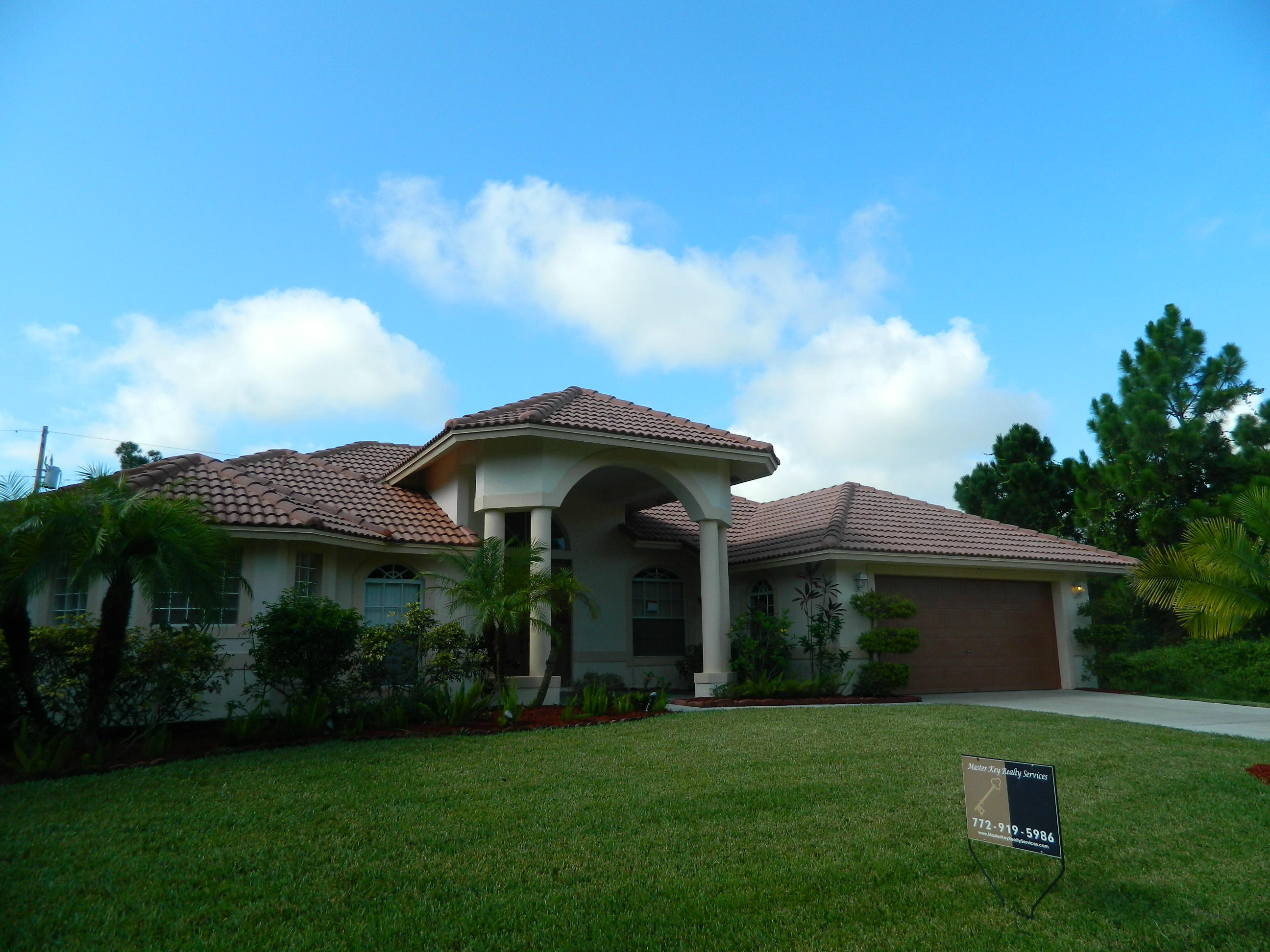 520 Southwest Ryder Road Port St. Lucie, FL 34953 - Photo 2 of 27 front