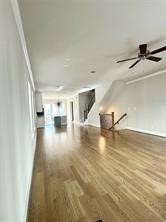 1315 West 24th Street, Unit B Houston, TX 77008 - Photo 14 of 26 a view of empty room with wooden floor