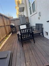 1315 West 24th Street, Unit B Houston, TX 77008 - Photo 24 of 26 a view of balcony with wooden floor and seating space