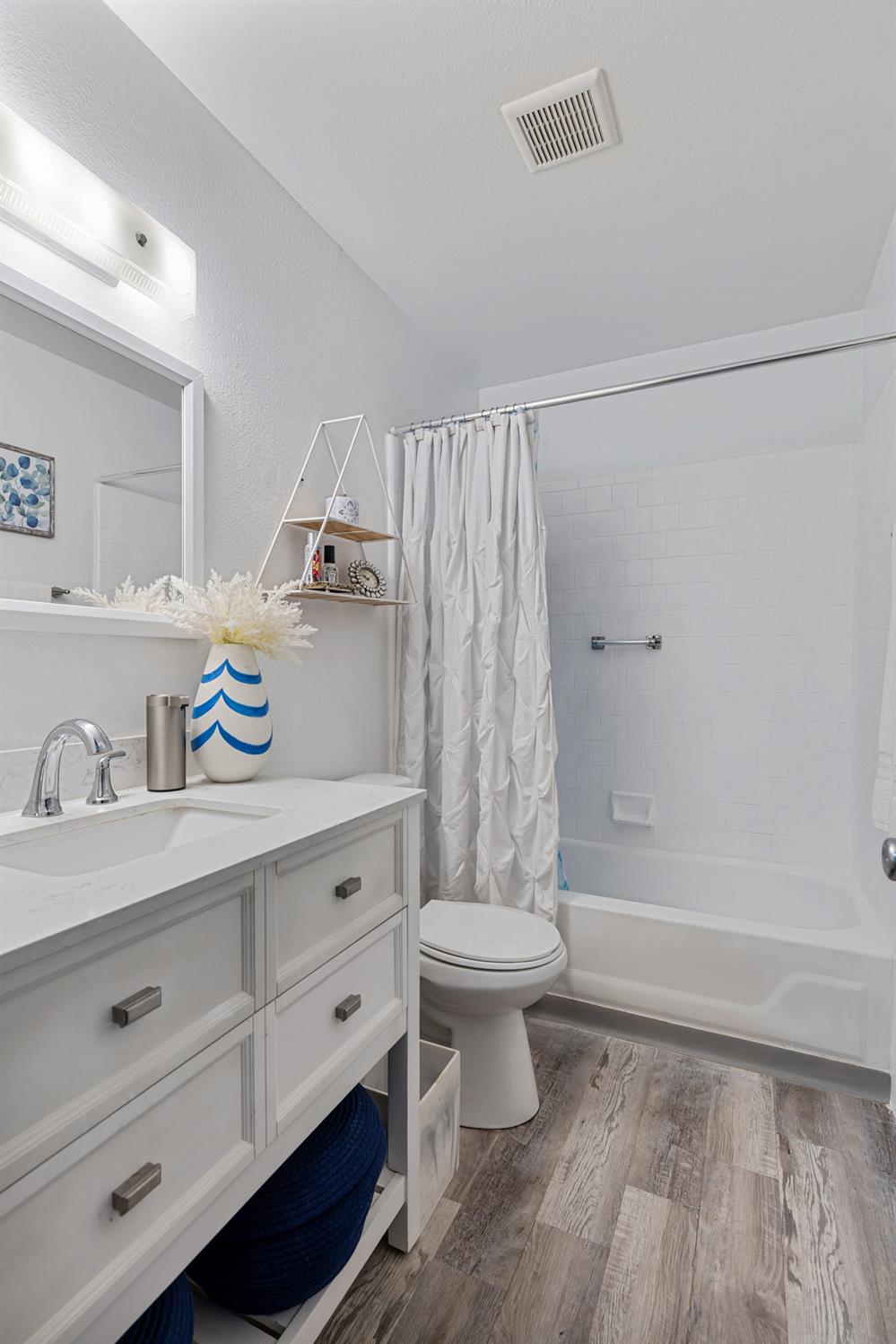 6415 Plymouth Road Stockton, CA 95207 - Photo 18 of 29 a bathroom with a sink toilet and shower