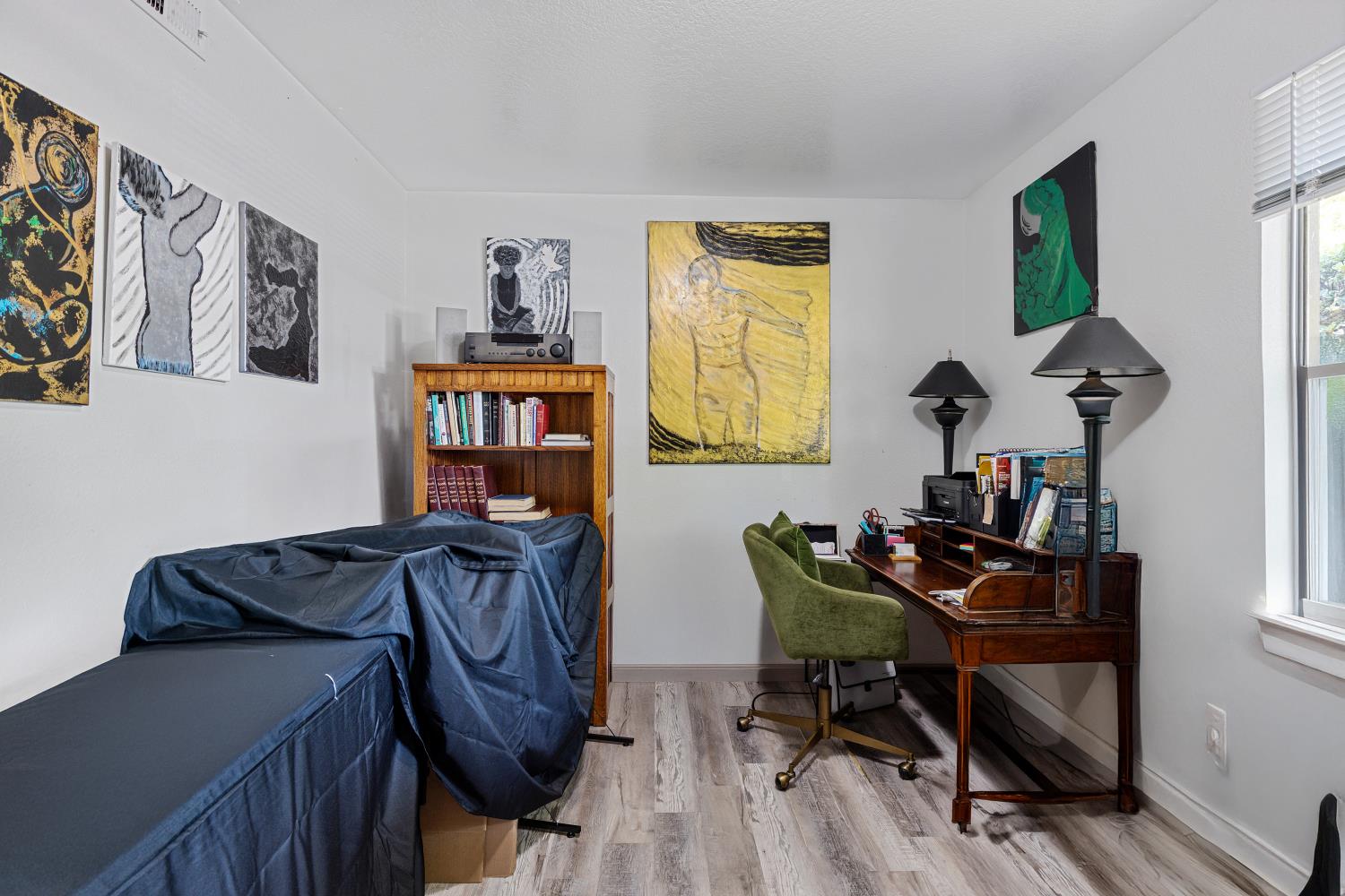 6415 Plymouth Road Stockton, CA 95207 - Photo 20 of 29 a view of a workspace with furniture and a window