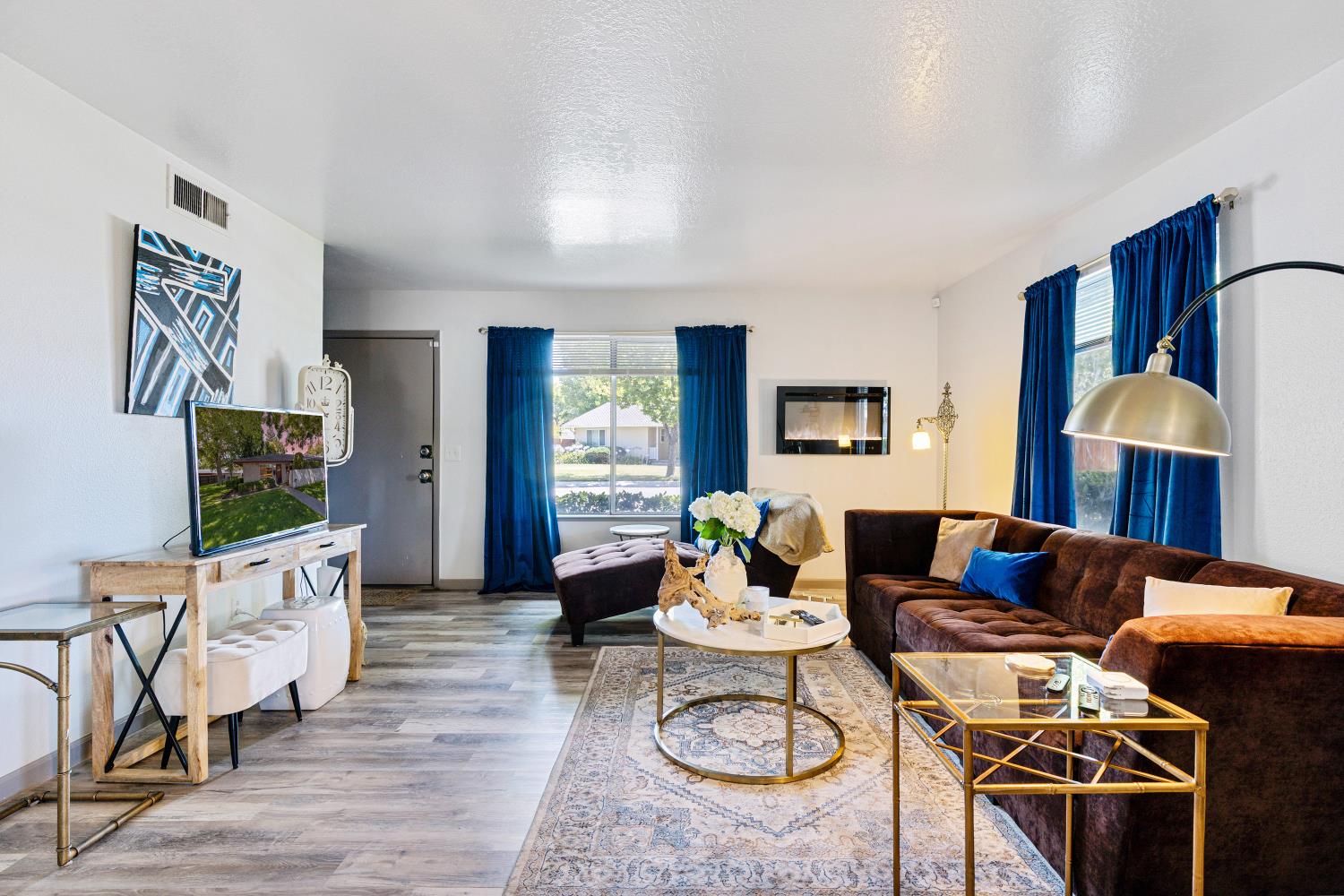 6415 Plymouth Road Stockton, CA 95207 - Photo 5 of 29 a living room with furniture and wooden floor