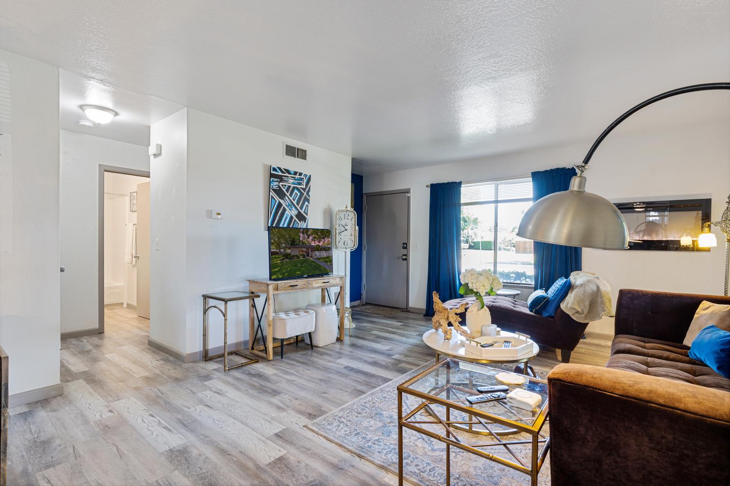 6415 Plymouth Road Stockton, CA 95207 - Photo 6 of 29 a living room with furniture and a fireplace