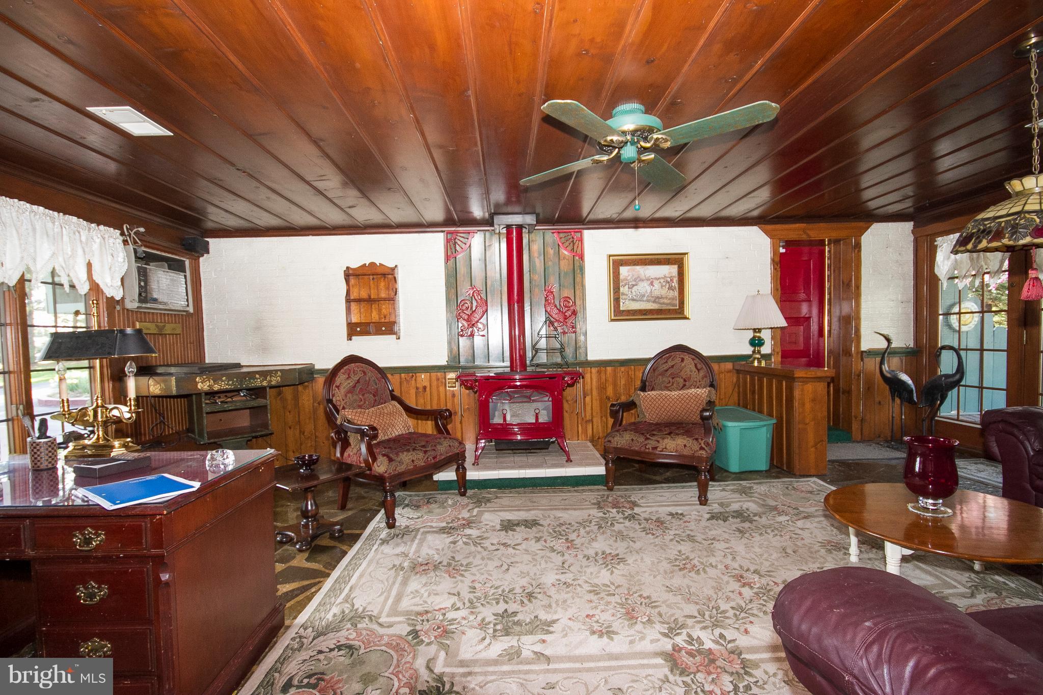 4009 Klausmier Road Baltimore, MD 21236 - Photo 3 of 24 a living room with furniture and a chandelier