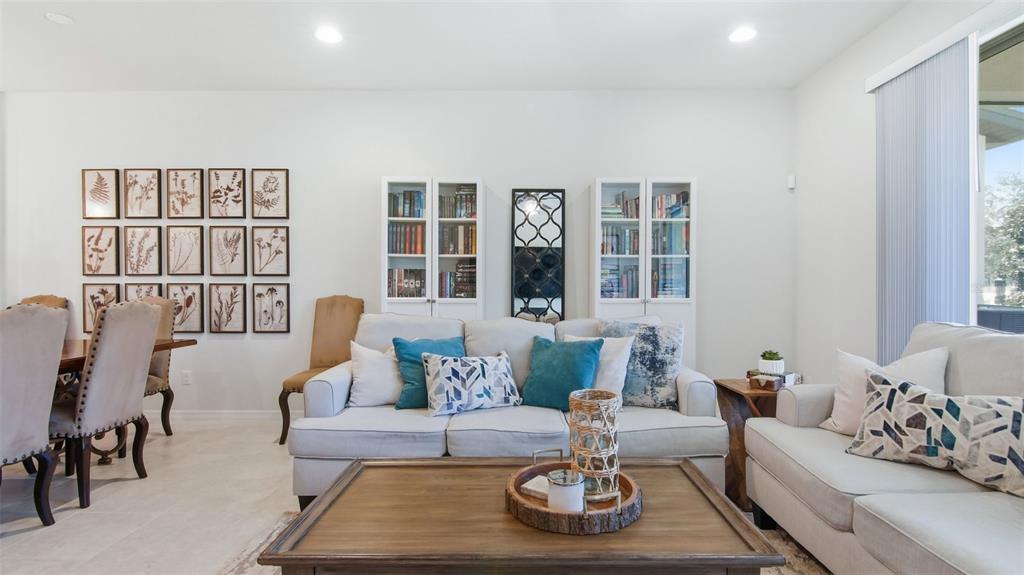 3013 Alessa Loop Apopka, FL 32703 - Photo 14 of 31 a living room with furniture