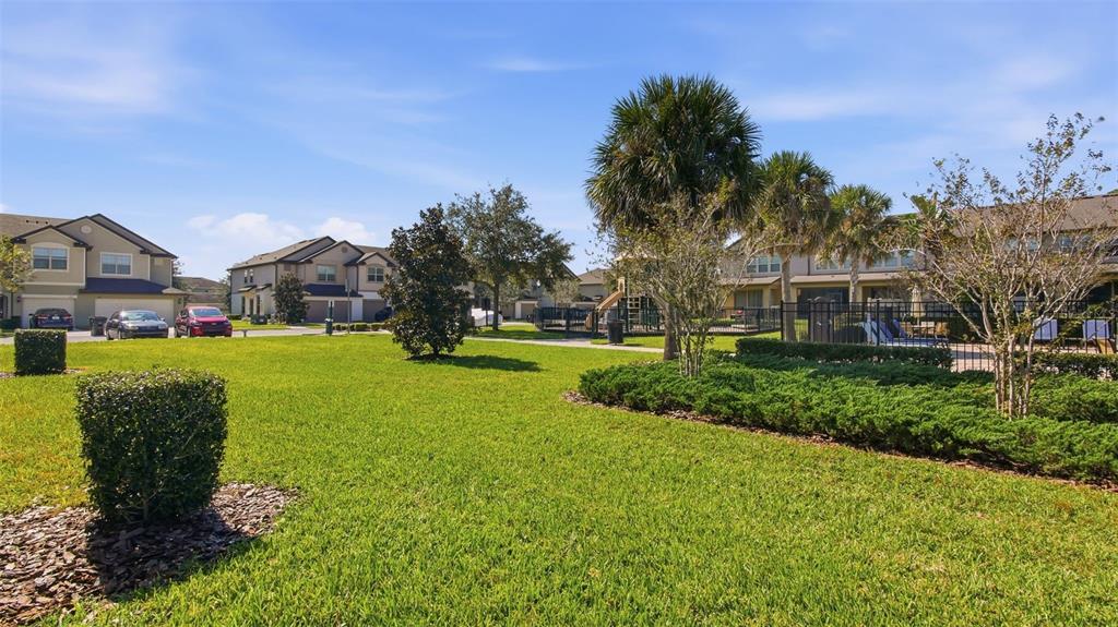 3013 Alessa Loop Apopka, FL 32703 - Photo 31 of 31 a view of a house with a big yard