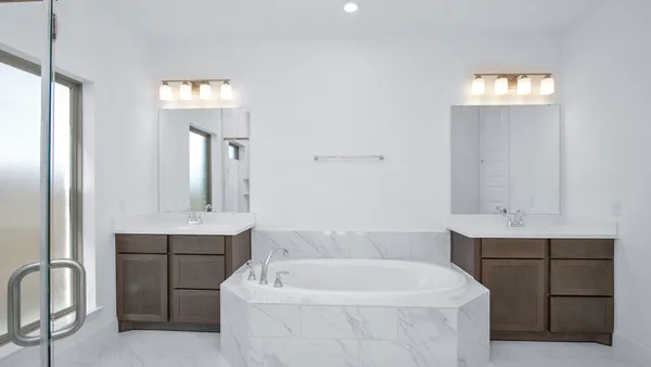 a bathroom with a sink a toilet and a bathtub