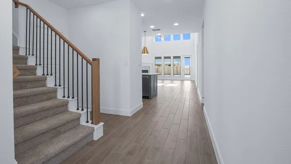 a view of entryway with wooden floor