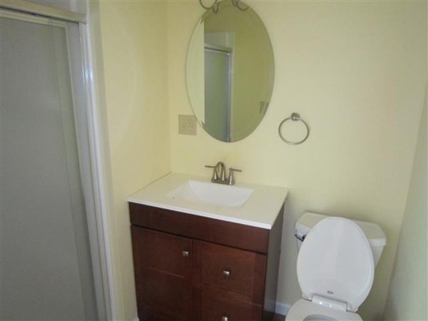 57 North Plain Road Sunderland, MA 01375 - Photo 5 of 13 a bathroom with a toilet sink and mirror